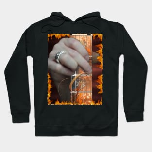 My hand forming the G chord. Hoodie